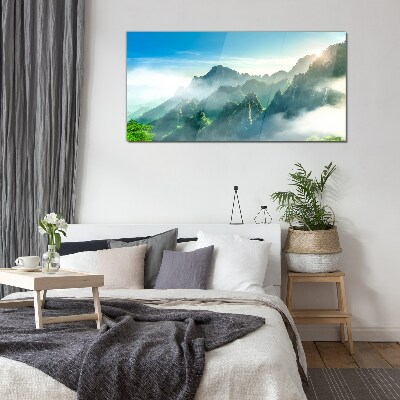 Mountain landscape on a misty morning Glass Wall Art