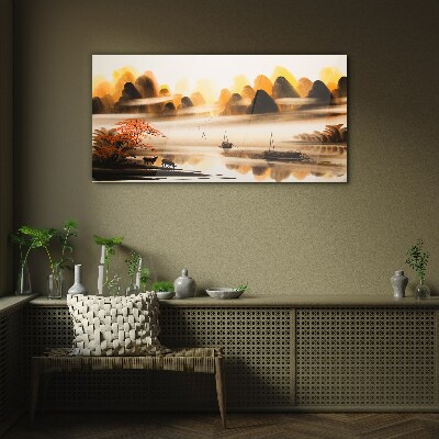 A peaceful landscape with mountains and water Glass Wall Art