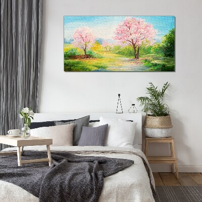Spring trees in pink blossom Glass Wall Art