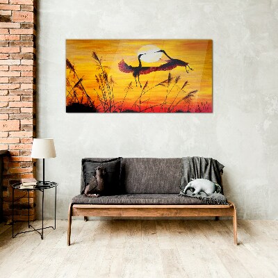 Dancing cranes at sunset Glass Wall Art