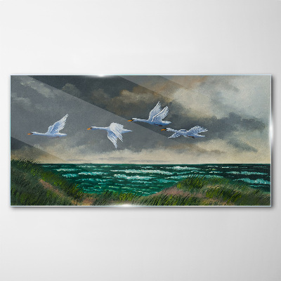 Flight of swans over the sea Glass Wall Art
