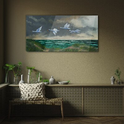 Flight of swans over the sea Glass Wall Art