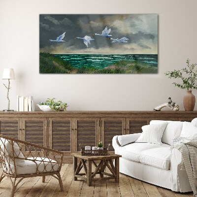 Flight of swans over the sea Glass Wall Art