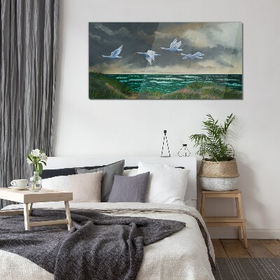 Flight of swans over the sea Glass Wall Art