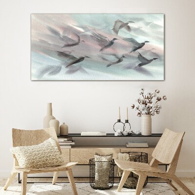 Flight of birds in a pastel aura Glass Wall Art