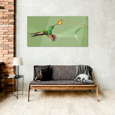 Hummingbird at a flower Glass Wall Art