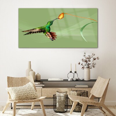 Hummingbird at a flower Glass Wall Art