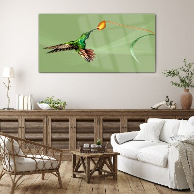 Hummingbird at a flower Glass Wall Art
