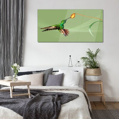 Hummingbird at a flower Glass Wall Art