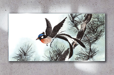 A bird in flight over the pines Glass Wall Art