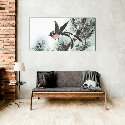 A bird in flight over the pines Glass Wall Art