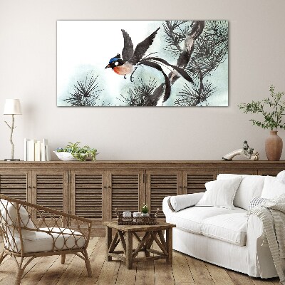 A bird in flight over the pines Glass Wall Art