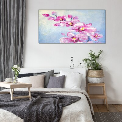 Pink orchids on a blue background Glass Wall Art