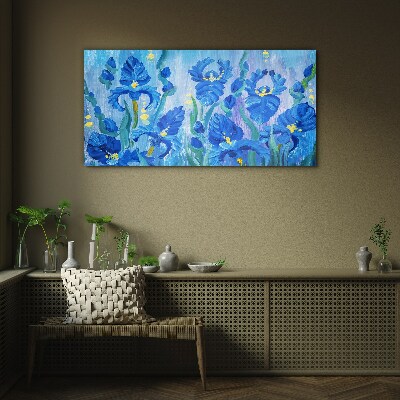 Blue irises against the blue background Glass Wall Art