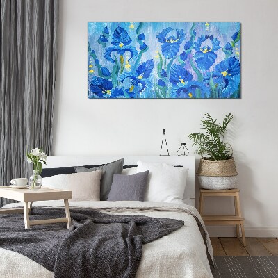 Blue irises against the blue background Glass Wall Art