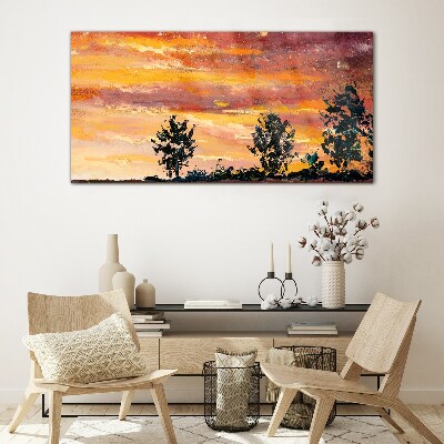 Sunset over the trees Glass Wall Art