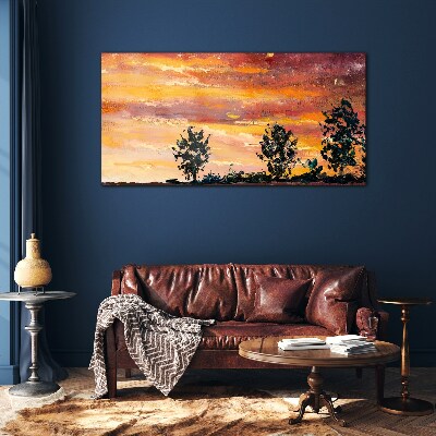 Sunset over the trees Glass Wall Art