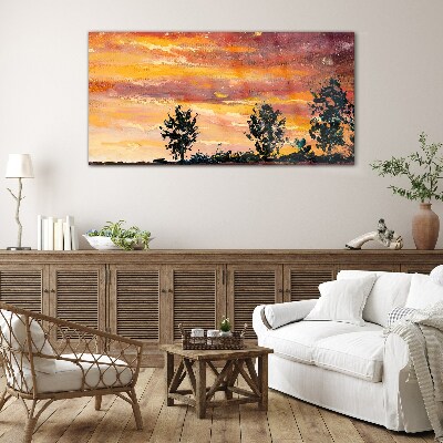 Sunset over the trees Glass Wall Art