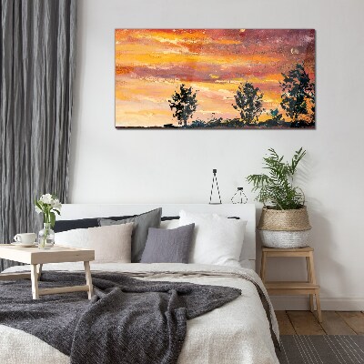 Sunset over the trees Glass Wall Art