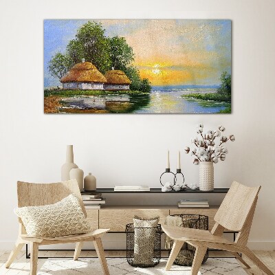 A peaceful sunset over the village Glass Wall Art