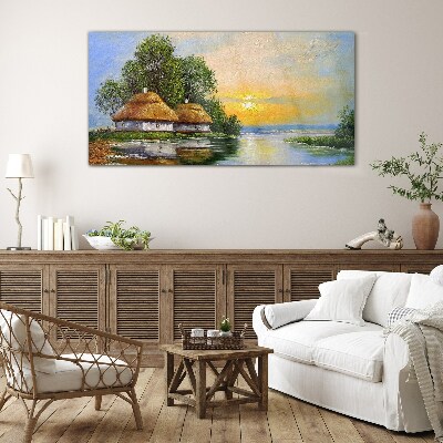 A peaceful sunset over the village Glass Wall Art