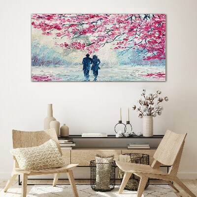 A spring walk under the blooming trees Glass Wall Art