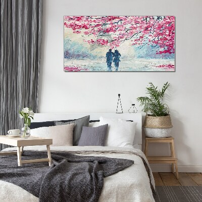 A spring walk under the blooming trees Glass Wall Art