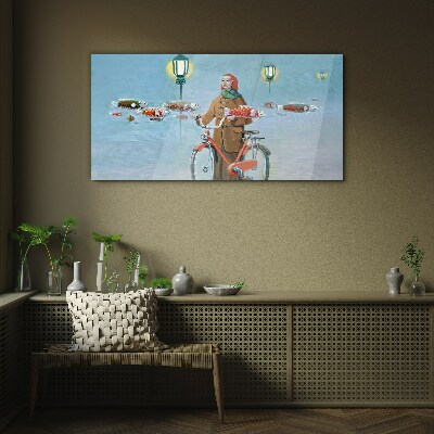 A cyclist's fish trip Glass Wall Art