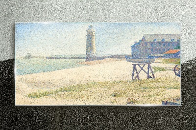 A lighthouse on the seashore Glass Wall Art