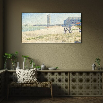 A lighthouse on the seashore Glass Wall Art