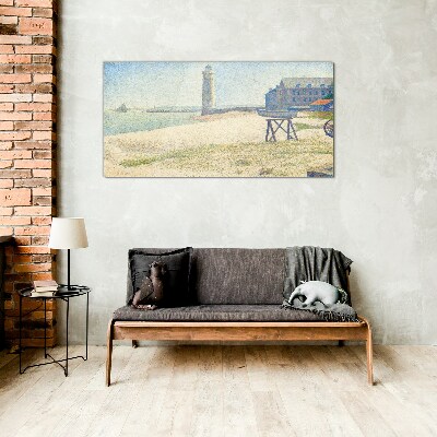 A lighthouse on the seashore Glass Wall Art