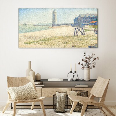 A lighthouse on the seashore Glass Wall Art