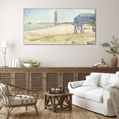 A lighthouse on the seashore Glass Wall Art