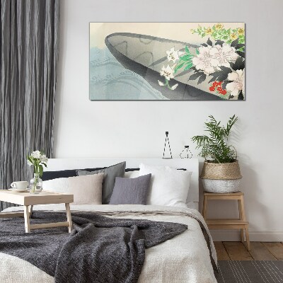 Flower boat on calm water Glass Wall Art