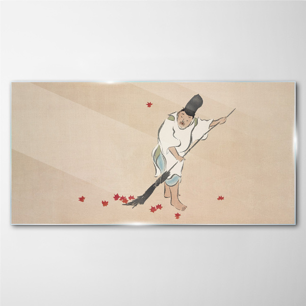 Monk cleaning with leaves Glass Wall Art