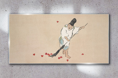 Monk cleaning with leaves Glass Wall Art