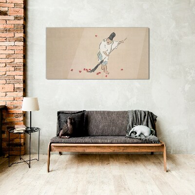Monk cleaning with leaves Glass Wall Art