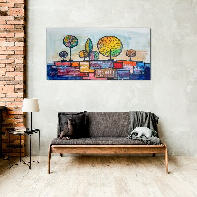 Colorful trees in an abstract landscape Glass Wall Art