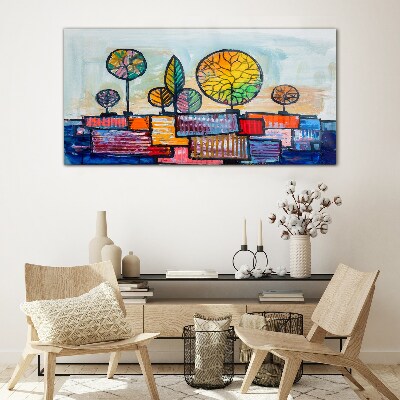 Colorful trees in an abstract landscape Glass Wall Art