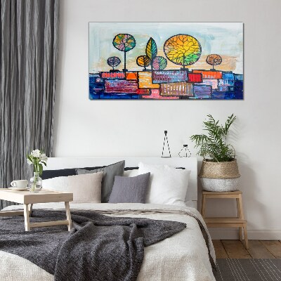 Colorful trees in an abstract landscape Glass Wall Art