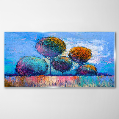 Colorful trees on a blue background Glass Print