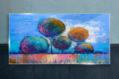 Colorful trees on a blue background Glass Print