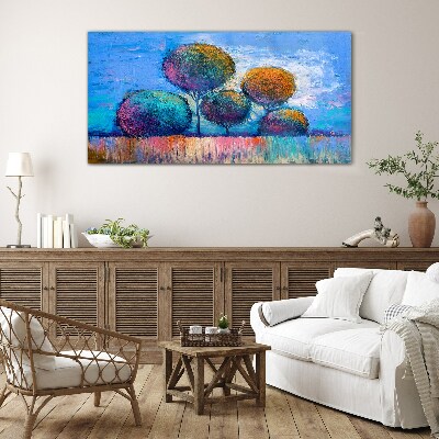 Colorful trees on a blue background Glass Print