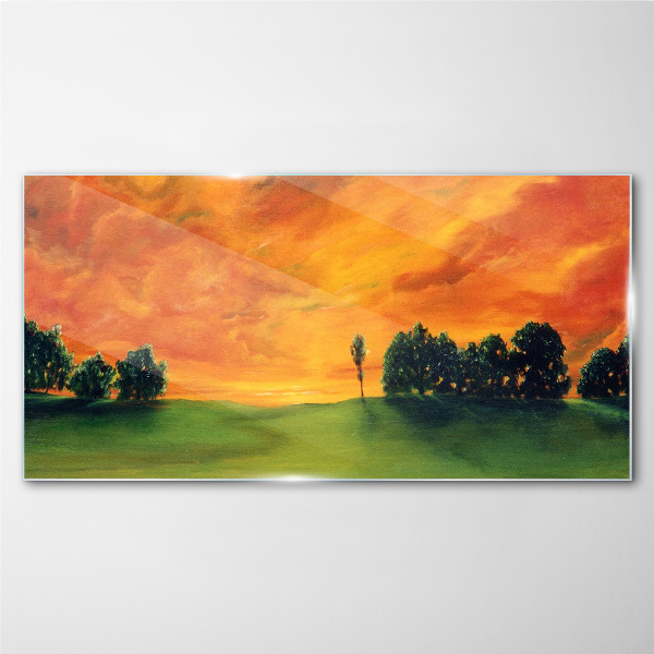 Sunset over the green hill Glass Print