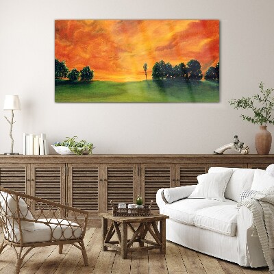 Sunset over the green hill Glass Print