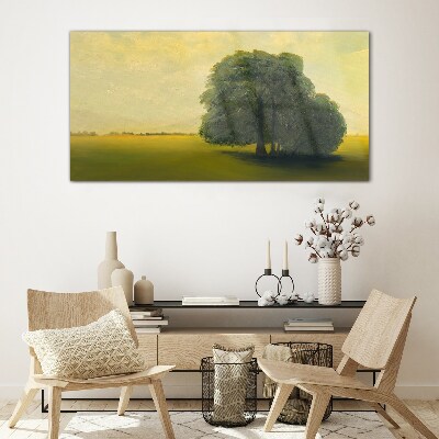 A peaceful landscape with a tree Glass Print