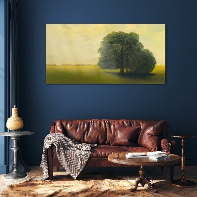 A peaceful landscape with a tree Glass Print