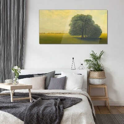 A peaceful landscape with a tree Glass Print