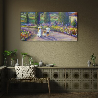 Family walk in a colorful garden Glass Print