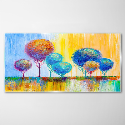 Colorful trees in the sunset light Glass Print